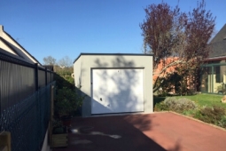 Garage Indépendant Toit terrasse béton enduit Doizon par Abridis